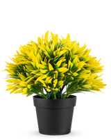La Pianta artificiale Sole giallo in vaso UV 22 cm ha un vaso da fiori nero con una fitta pianta artificiale con foglie gialle e verdi appuntite, perfetta per illuminare ogni stanza.