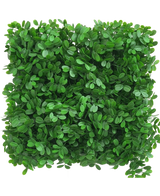 De Kunsthaag Schefflera 50x50 cm UV heeft een dichte vierkante patch van kunstgroene bladeren, gerangschikt om een gestructureerd, bladerig oppervlak tegen een witte achtergrond te creëren.
